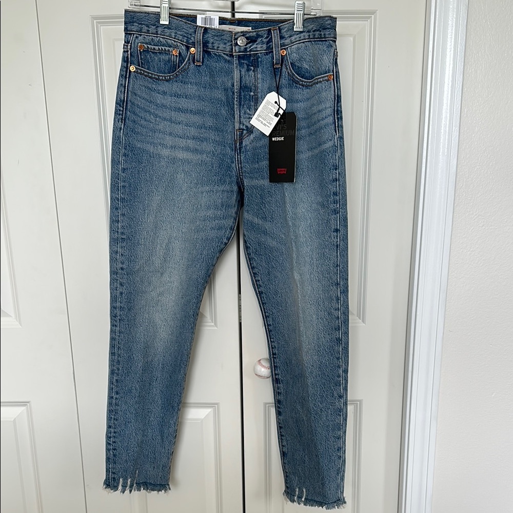 Levi’s wedgie blue jeans fray hem high waisted button fly sz 29. NWT